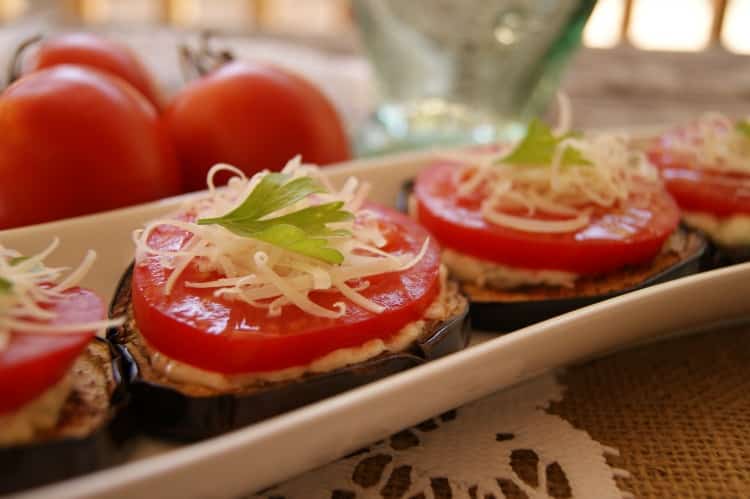 Roasted Eggplant and Tomato Appetizer with garlicky mayo center. 