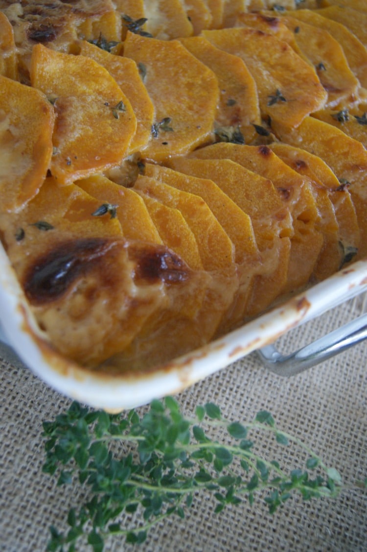 Scalloped Butternut Squash with Thyme and Caramelized Onions - perfect blend of flavors and accompanied with heavy whipping cream. Perfection of sweet and savory flavors in one dish!