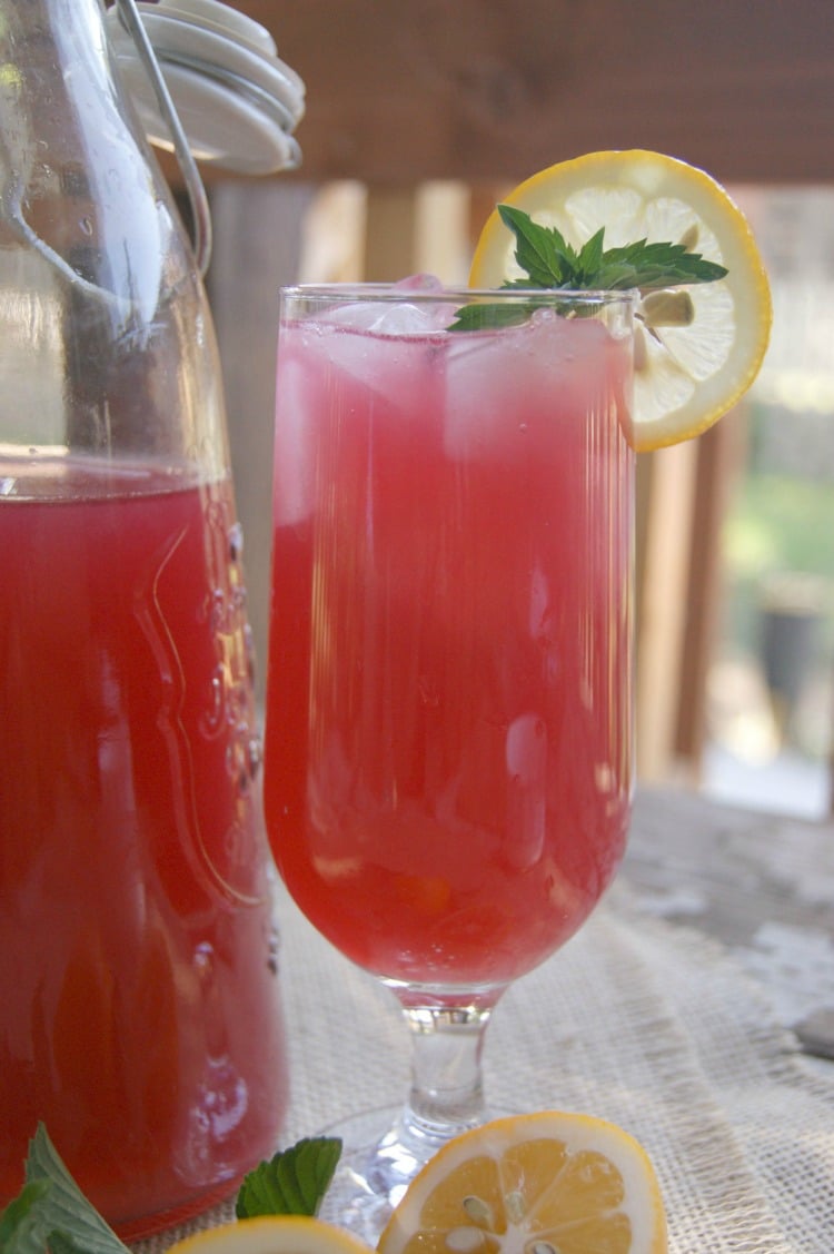 Real Food Punch - made with Vitamin C rich hibiscus, sweetened with honey and a touch of lemon. It's a great alternative to corn syrup drinks on the market. 