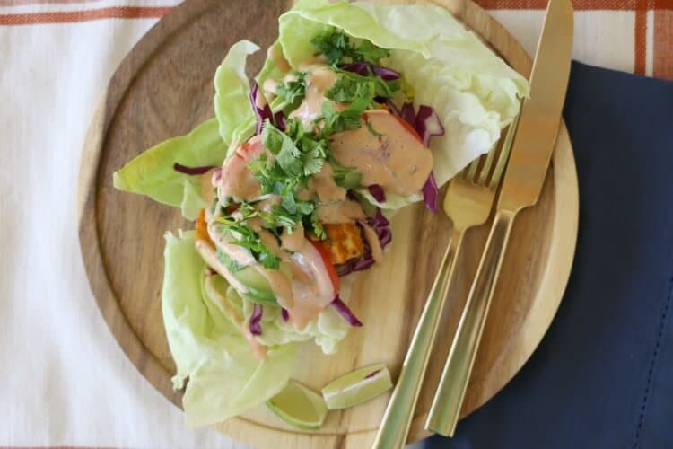 Cajun Fish Tacos with Zesty Dressing - can be enjoyed with sprouted tortillas or go paleo and use lettuce wraps. Check out the recipe!