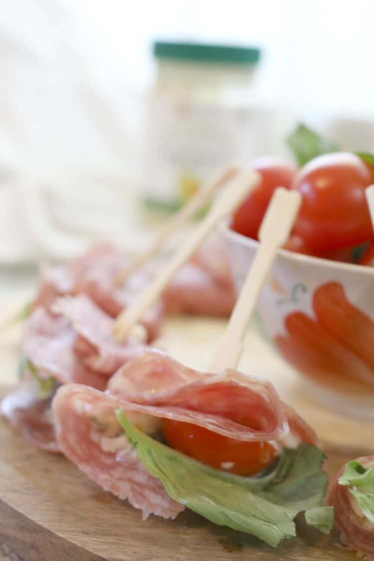 Antipasto Caprese Bites - A twist on Caprese Salad made in the form of small appetizers and wrapped in another Italian favorite, cured salami.