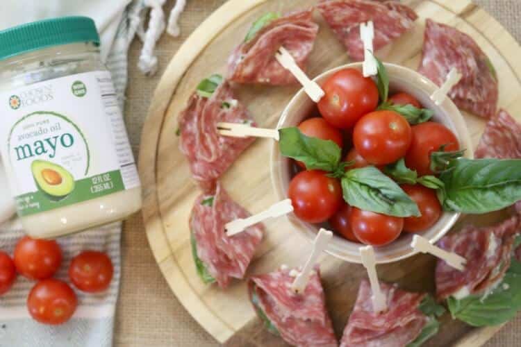 Antipasto Caprese Bites - A twist on Caprese Salad made in the form of small appetizers and wrapped in another Italian favorite, cured salami.